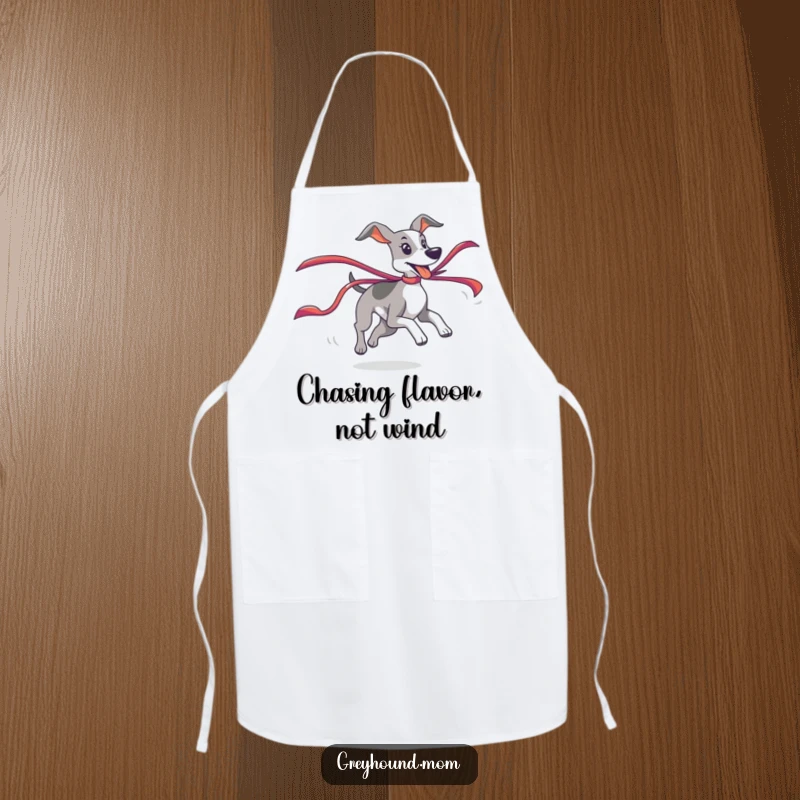 Funny Greyhound Apron depicting a playful chase of a colorful ribbon, ideal for a humorous cooking gift.