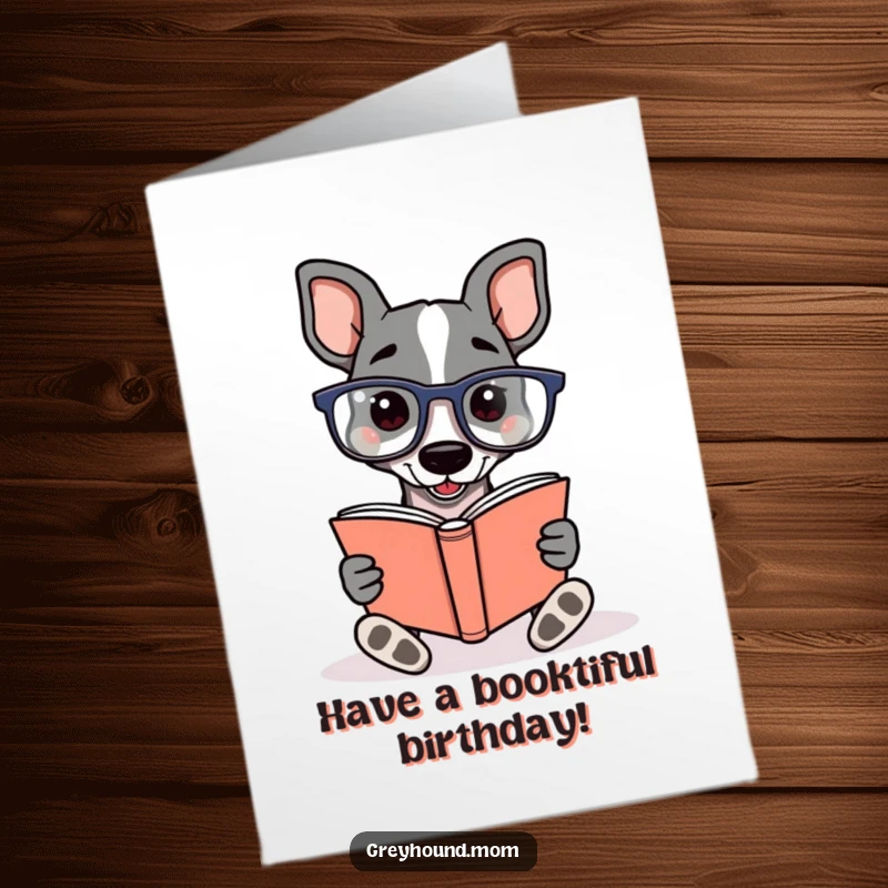Funny Free Printable Greyhound Birthday Card: Dog wearing reading glasses engrossed in reading a book.
