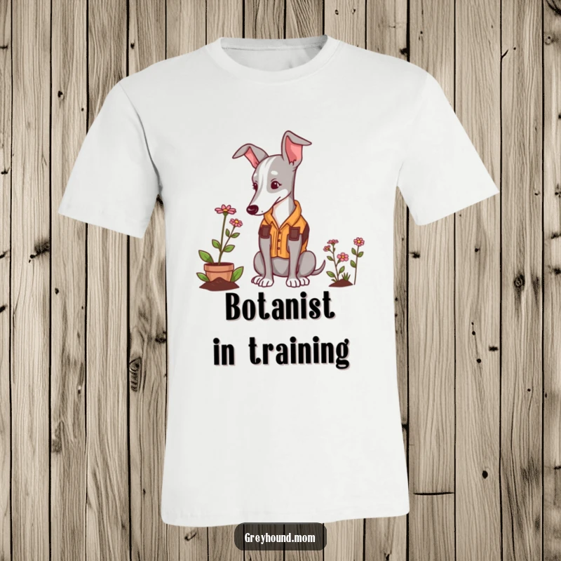 Funny Greyhound gardener t-shirt, a dog in a vest looking lovingly at a tiny flower.