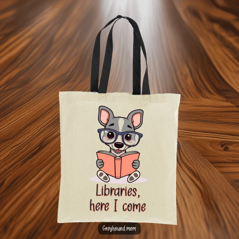 Funny Greyhound wearing reading glasses, deeply engrossed in reading a book, on a practical tote bag for book lovers.